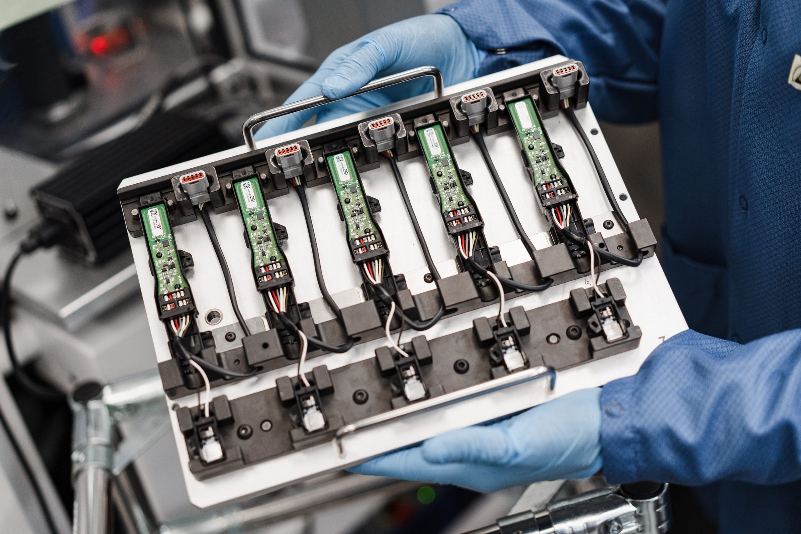 OEM automotive supplier showcasing advanced electrical engineering with wire and sensor systems